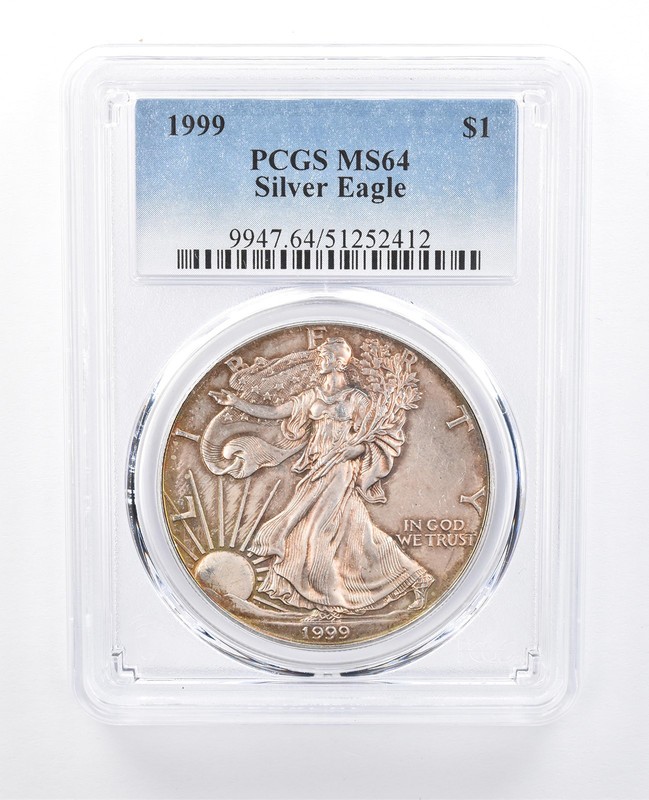 1999 American Silver Eagle MS64 PCGS Yellow Tone a8142