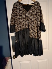 Unusual patterned Knit Long top With Taffeta Frill At Hem and Cuffs