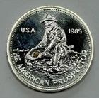 1985 Engelhard 1oz .999 Silver American Prospector Round with GOLD NUGGET In Pan