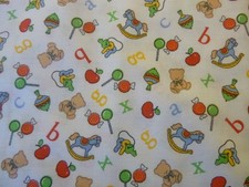 Baby items and letters on white Cotton Fabric 44" Wide x 36" long