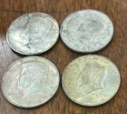 4 1964 Kennedy Silver Half Dollars