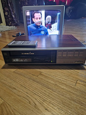 Quasar VH5251YW VHS Video Cassette Recorder 4-Head True Track 4 w/Remote
