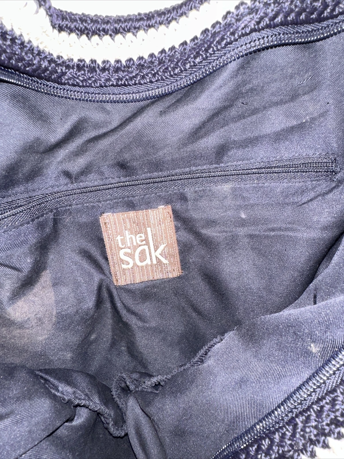 Borsa a tracolla The Sak Gypsy blu navy panna a righe all'uncinetto *Leggi*