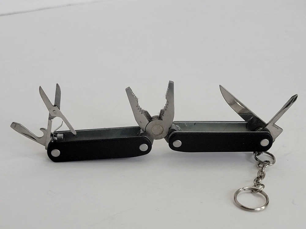 Multi tool knife Pliers Scissors Bottle Opener Phillips Screwdriver - Used