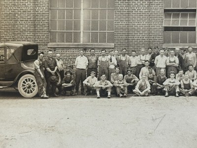 Antique 1920s Factory Worker Group Photo Brick Mill w/ Sign, 80 Men Note