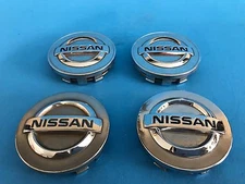 NISSAN CENTER CAPS CHROME GENUINE FACTORY ORIGINAL OEM 40343 5Y700 OEM SET OF 4