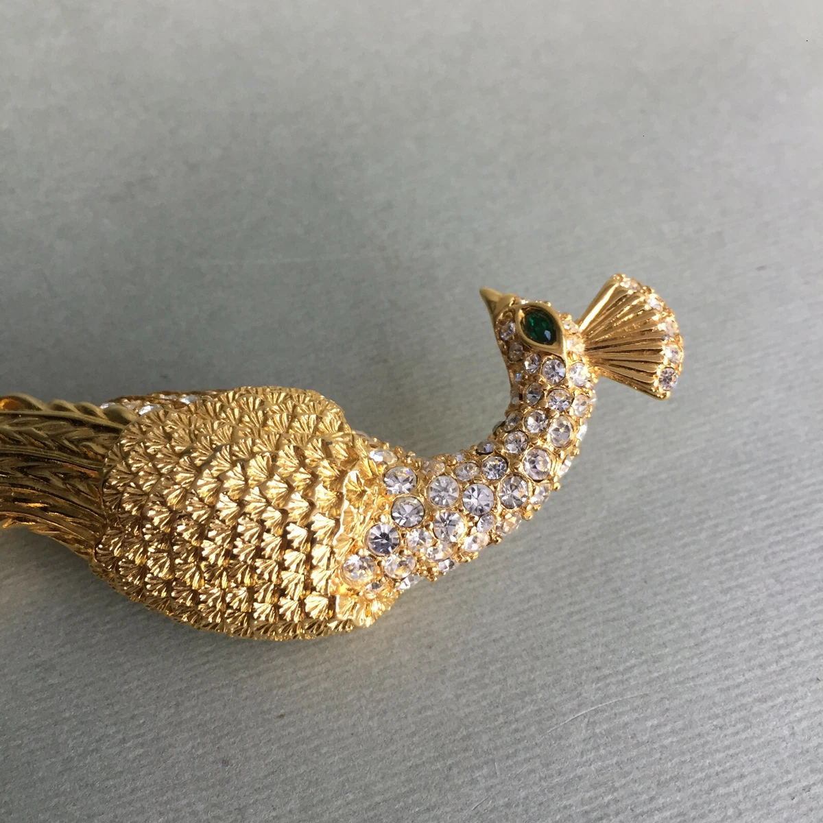 Antique store peacock brooch