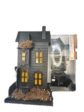 Illuminated Haunted House Black with Yellow Windows Halloween Village Decor