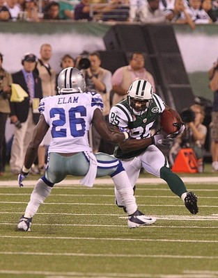 Wide Receiver Derrick Mason New York Jets has a long gain when the- Old Photo
