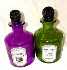 Set of 2 Halloween Glass Bottles w/ Black Skull Stoppers Purple Green