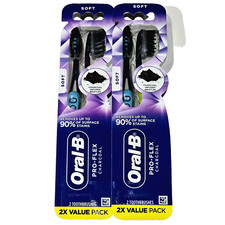 2 Packs Of 2 Oral-B Pro-Flex Charcoal Infused Toothbrushes Soft Blue Green Black