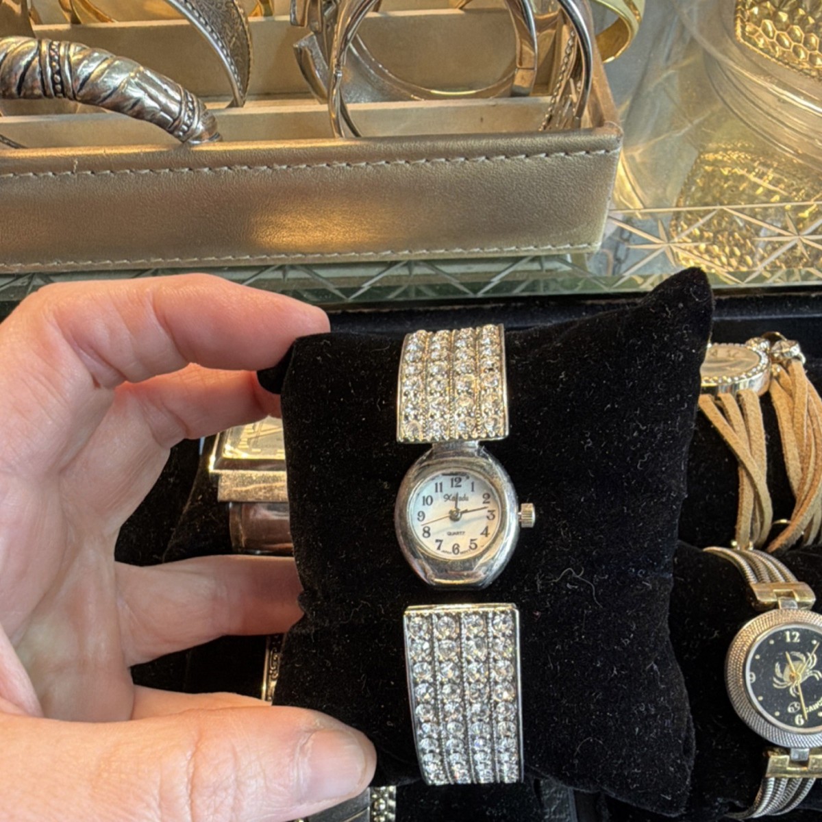 Vintage Xanadu Silver and Crystal peekaboo hinged bangle Watch