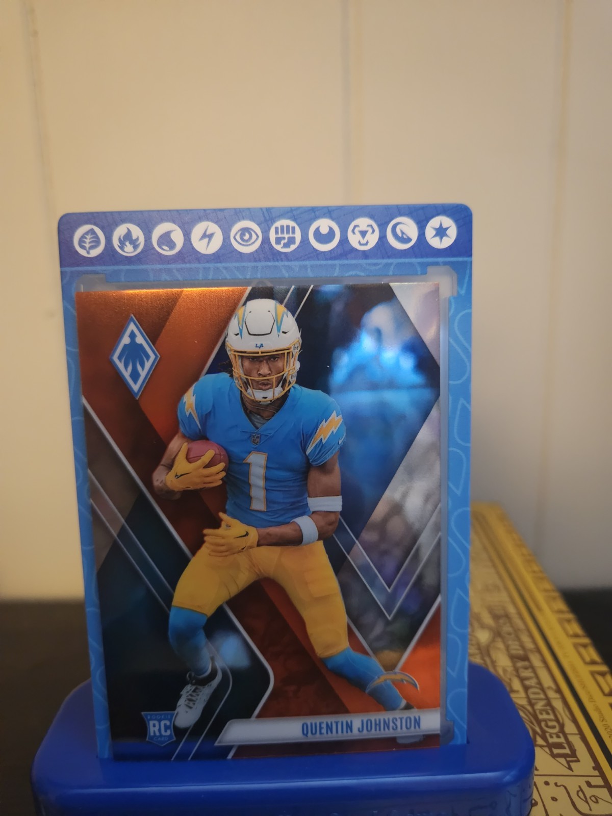 2023 Panini Phoenix - Rookies Quentin Johnston #107 Orange Seismic /99 (RC)