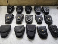 Lot of 15 handcuff holsters 12 Leather 3 Nylon (Safariland, Dutyman, Gould, Tex