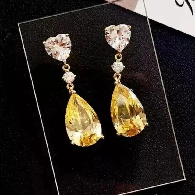 Pendientes colgantes de citrino enchapados en oro amarillo de 14 K con corte de pera de 3,50 quilates creados en laboratorio Foto 3 de 4