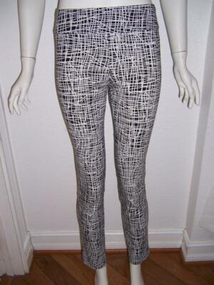 Pantalon fluide beige imprimé tropical resserré aux chevilles