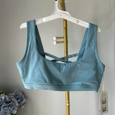 Blogilates women’s crisscross back Sport bra in cameo blue size large NEW
