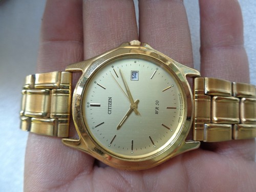 RARE MEN'S GOLD PLATED CITIZEN WR 50 DATE QUARTZ WRIST WATCH WITH TITAN  BAND | eBay