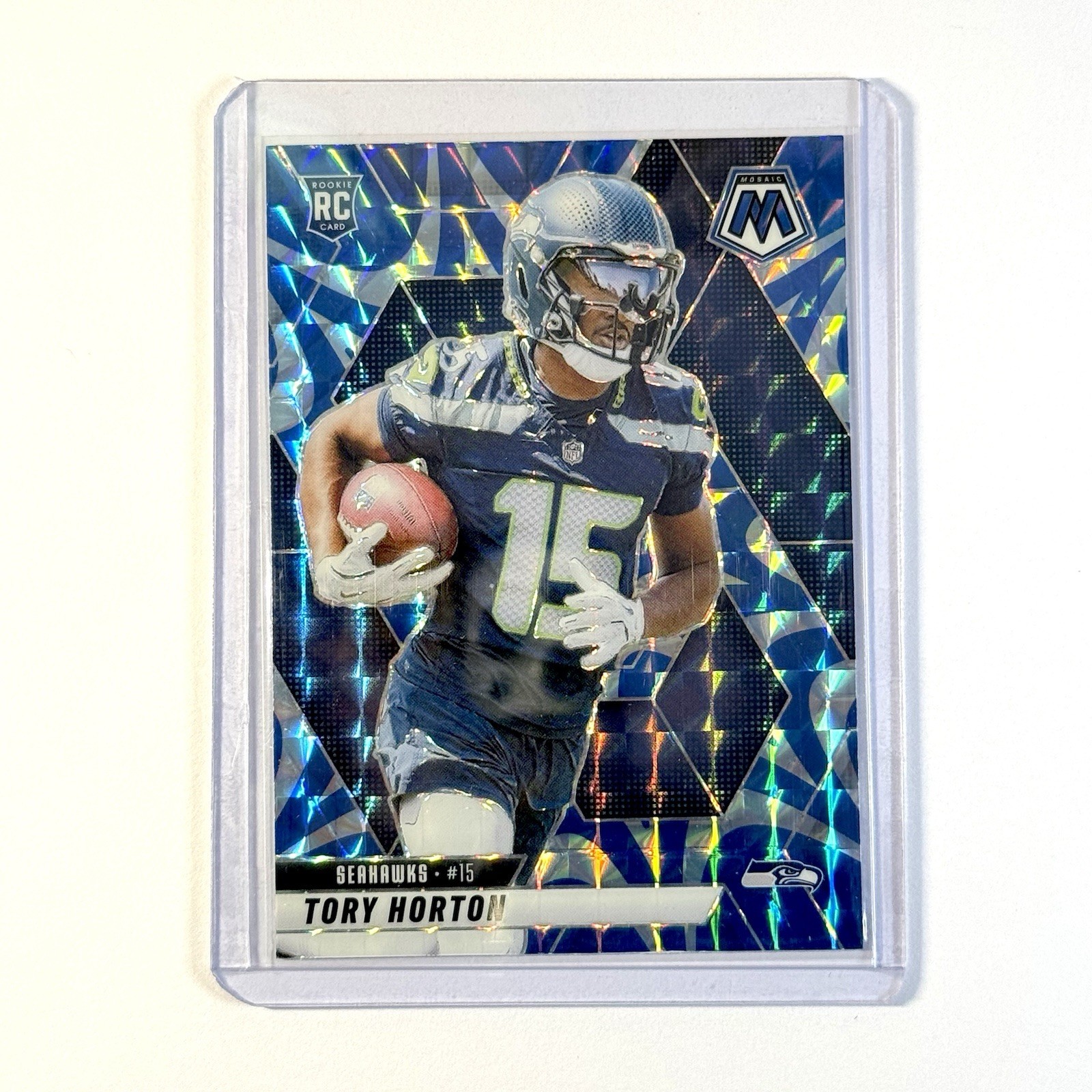 2025 Panini Mosaic - Rookies Tory Horton #396 Reactive Blue Mosaic Prizm (RC)