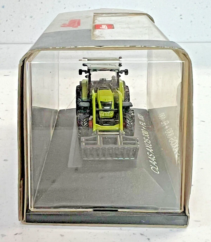 Schuco 1:87 25597 Claas Axos 330 + FL 100 Tractor in Original Box - Image 4 of 4