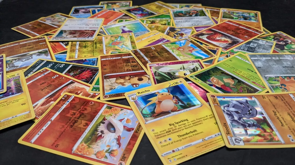 100 Assorted Pokemon Trading Cards with 7 Bonus Free Holo Foils