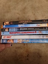 6 Pack Of DVD's Mix Lot (Rango, Sinbad,Get Smart, Bourne Identity, Hunger Games)