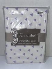 The Peanut Shell Changing Pad Cover white with Purple triangles.