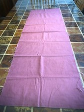 Raspberry pink flannel remnant, 60"W x 19.5"L. Great for a variety of uses.