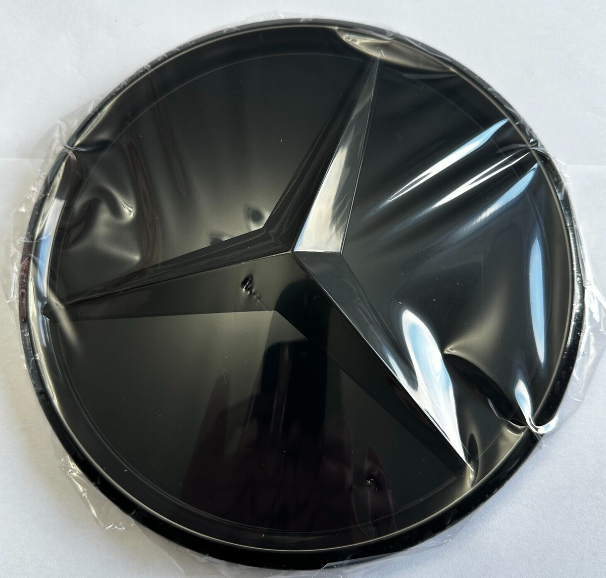 Genuine Mercedes-Benz Black Glossy Raised Star Grille Emblem – W177 W205 W247 (2018–2023)