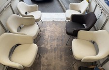 Set of 5 white and 1 brown Eero Saarinen for Knoll Executive Dining Arm Chairs