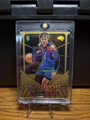 2024-25 Obsidian Paolo Banchero Atomic Initials Electric Etch Bronze Flood #/60 