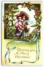 Postcard Wishing Merry Christmas Children Holly Gold Gilt Embossed c1912