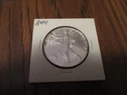 2004 SILVER AMERICAN EAGLE 1 OUNCE .999 SILVER SOME TONING ON THE RIM