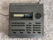 Roland MC-50 Micro Composer Sampler Sequencer with AC Adapter & Manual