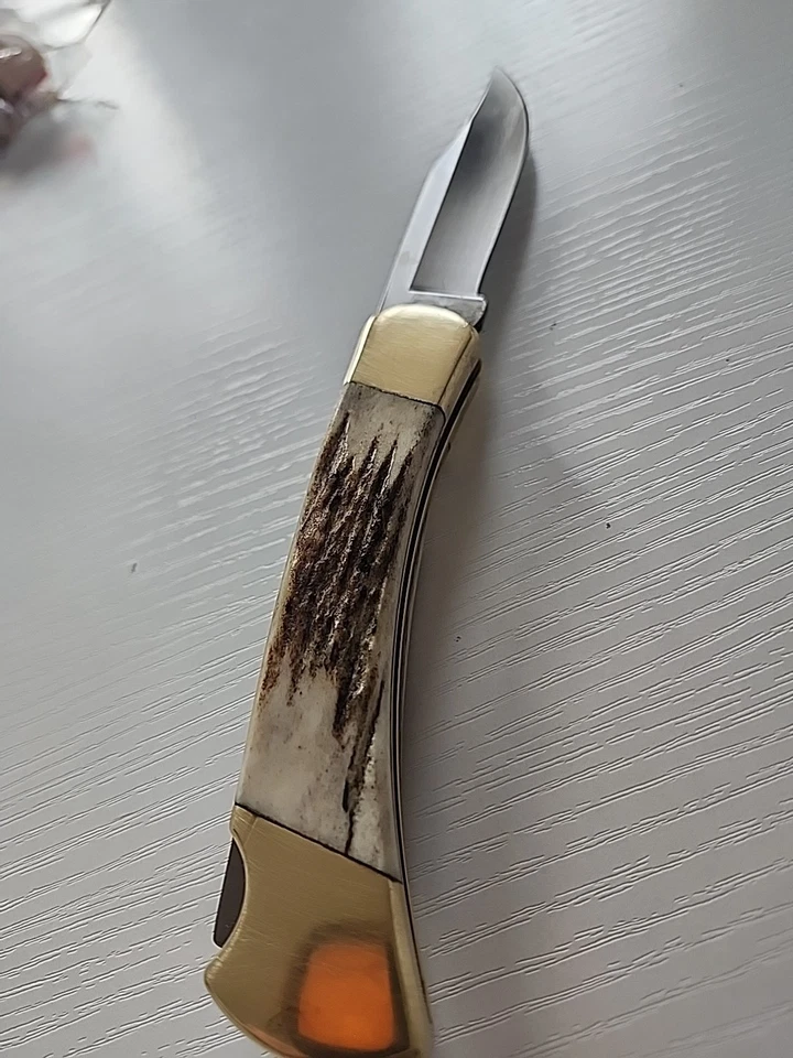Cuchillo de asta de ciervo Buck 110 vintage de latón con mango de ciervo y funda Foto 4 de 4