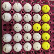 Twenty four Titleist Tour Soft Golf Balls
