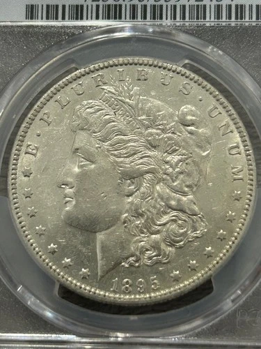 KEY, 1895-O MORGAN SILVER DOLLAR, PCGS AU-details scratch. Beautiful mint luster