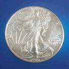 1986 SILVER EAGLE Coin- HARD TO FIND? GOT ONE HERE FOR YA! DON'T MISS THIS ONE!