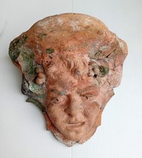 Antica mensola in terracotta, volto antropomorfo di baccanale