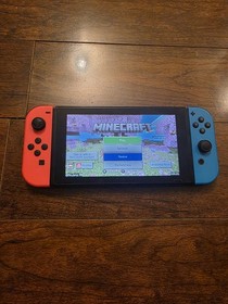 Nintendo Switch with Neon Blue and Neon Red Joy-Con (HAC-001-01)