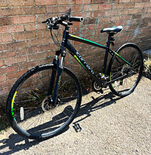 Carrera Crossfire Hybrid Bike 700C 20in Black/Green Front Sus Disc 24 Speed