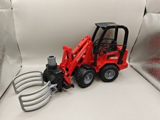 Bruder Schaffer Loader 2630 with Bale Adjustable Gripper Model