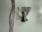 Drawer knobs that are Crystal like.  Plastic.  Less than 1 inch wide. Quantity 6 — photo 3