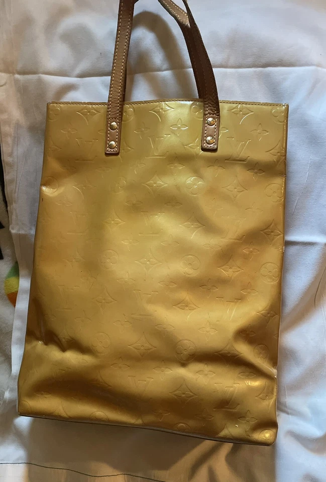Louis Vuitton amarillo con LV uso auténtico Foto 4 de 4