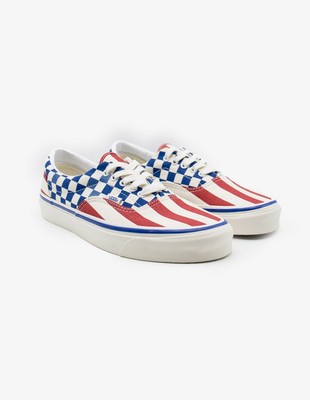light blue slip on vans with checkered stripe