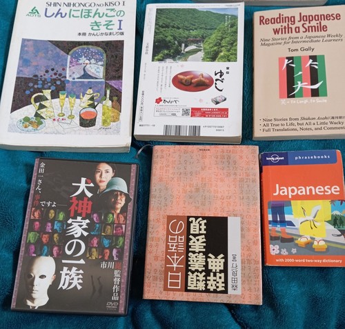Bundle of Japanese books, a phrasebook plus 1 DVD