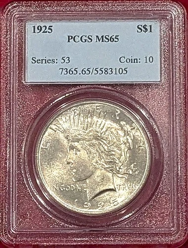 1925 PEACE SILVER DOLLAR GRADED AN MS65 BY PCGS WITH LIGHTED KEEPSAKE BOX