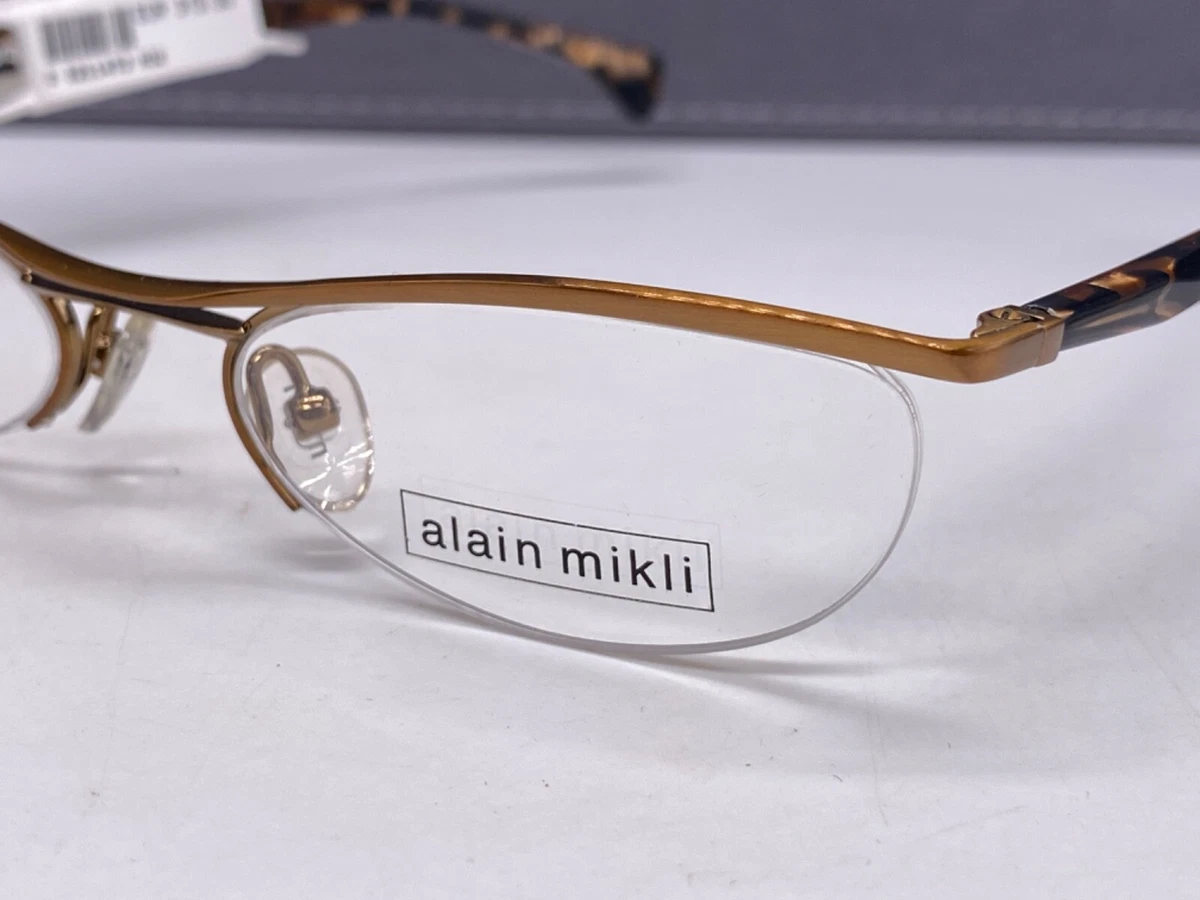 NEW Alain Mikli Titane‎ Oval Eyeglasses Women Amber Brown 41mm France Alain Mikli Women Titanium Eyeglass Frames for sale | eBay main image 3