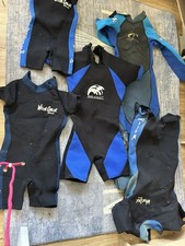 Wetsuits x 5 .Size mixed adults and kids job lot..all great condition
