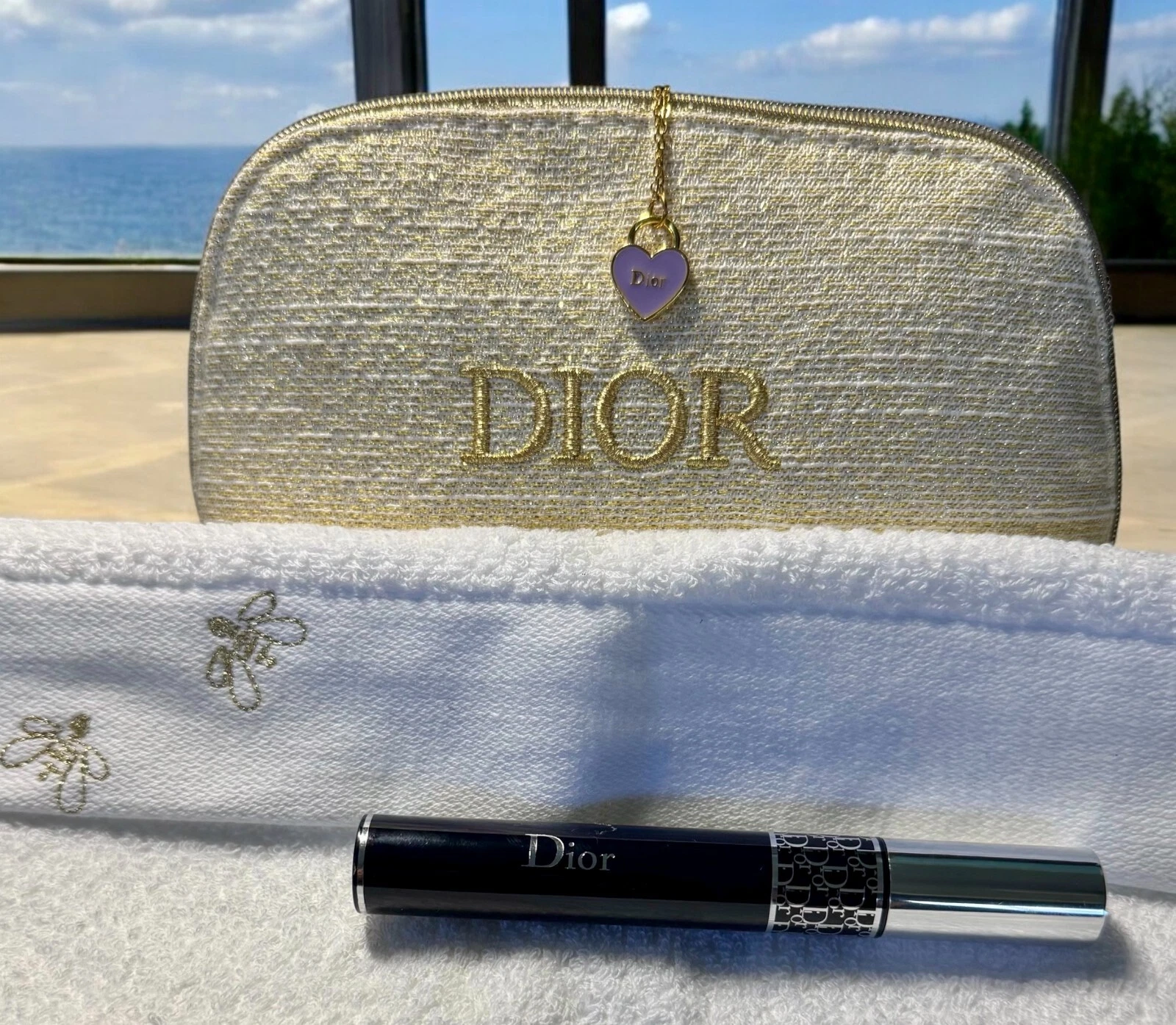 Dior sacchetto trucco collana e mascara con panno viso A Guerlain Paris